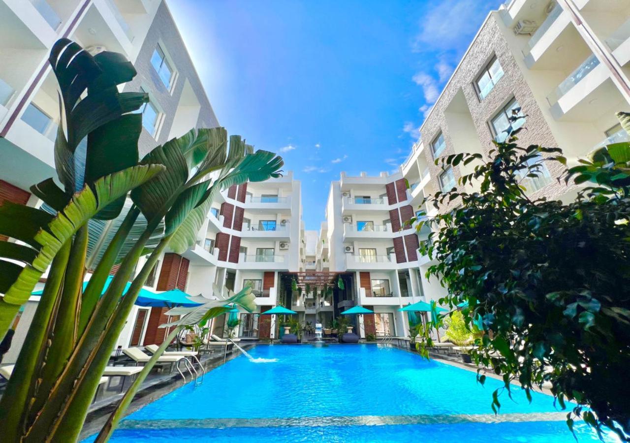 Sanctuary Sunlit Hurghada Haven With 4 Pools, Rooftop Sunsets & Gourmet Bites Steps Away Exterior photo